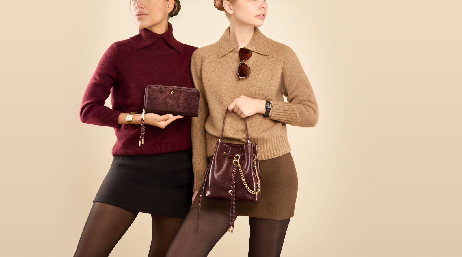 Two models carrying Cacharel leather accessories